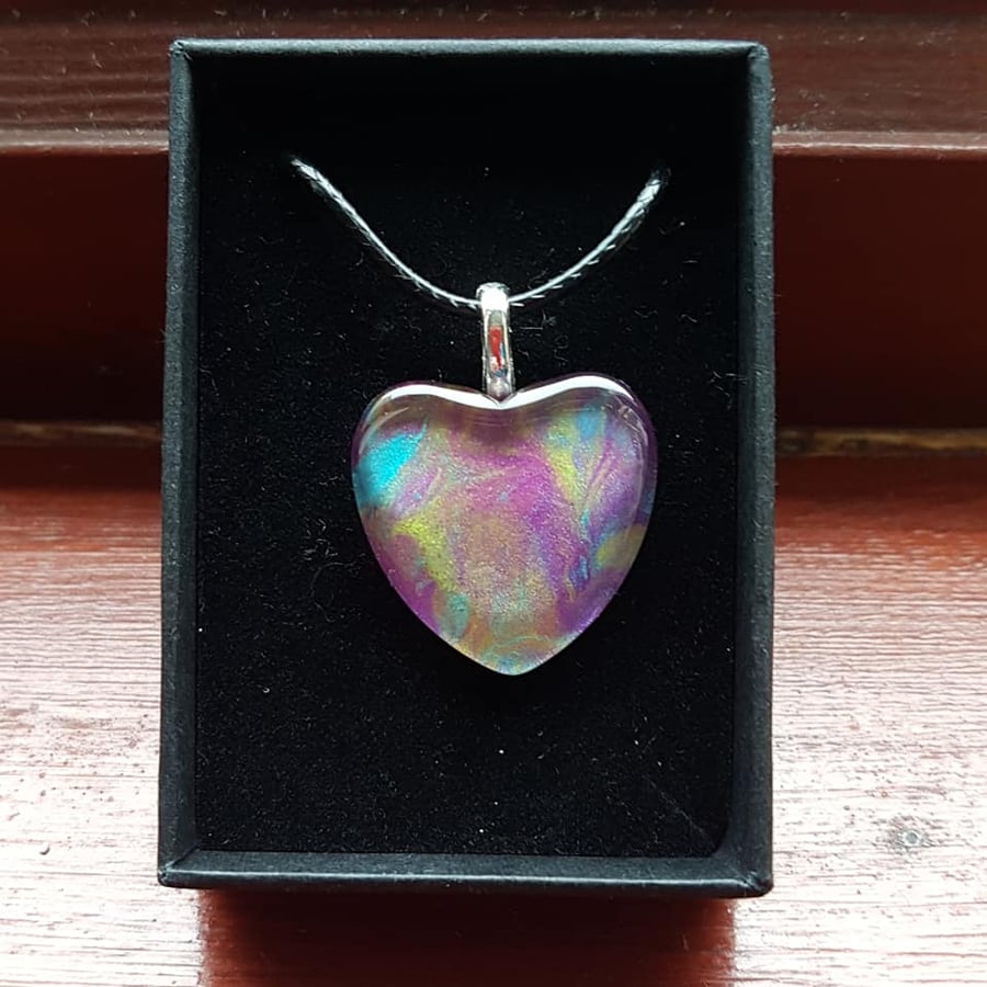 Colourful glass heart pendant necklace.