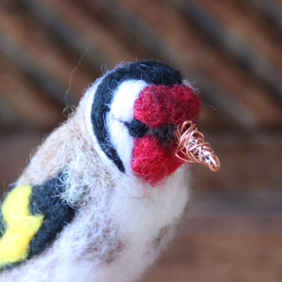 Needle felted goldfinch sculpture