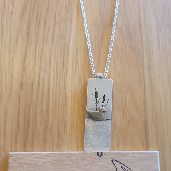 Sterling silver necklace - brass duck swimming on a pond