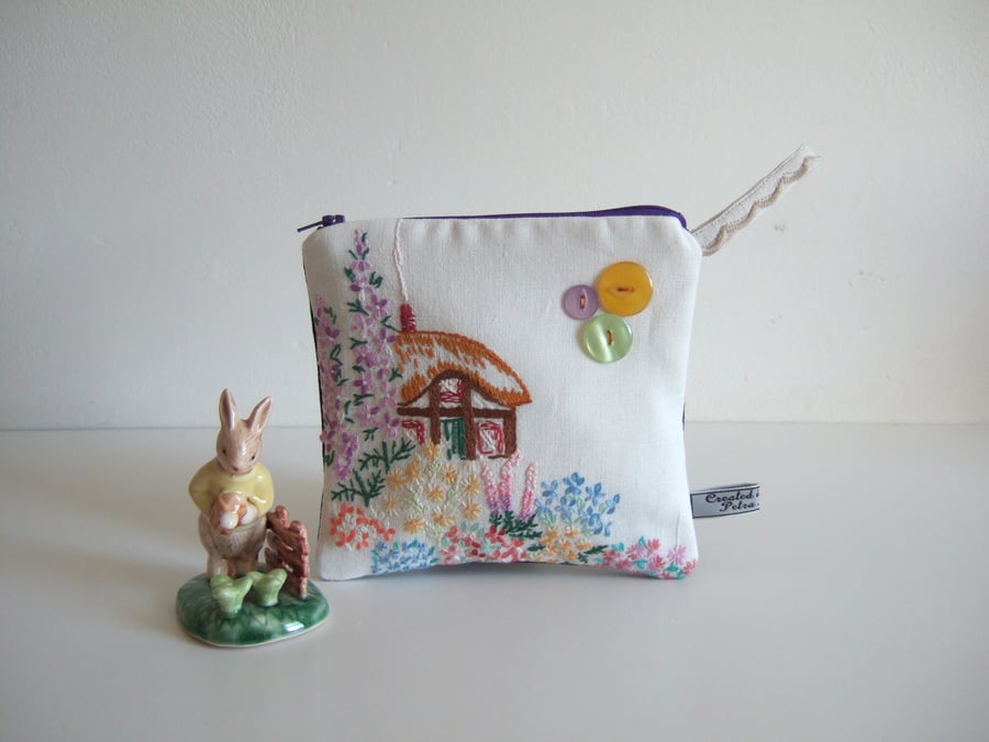 Craft Make up bag or storage pouch with a vintage embroidered thatched cottage.