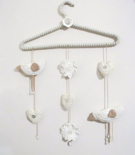 crochet bird, flowers and hearts hanging wall decorations in neutral shades