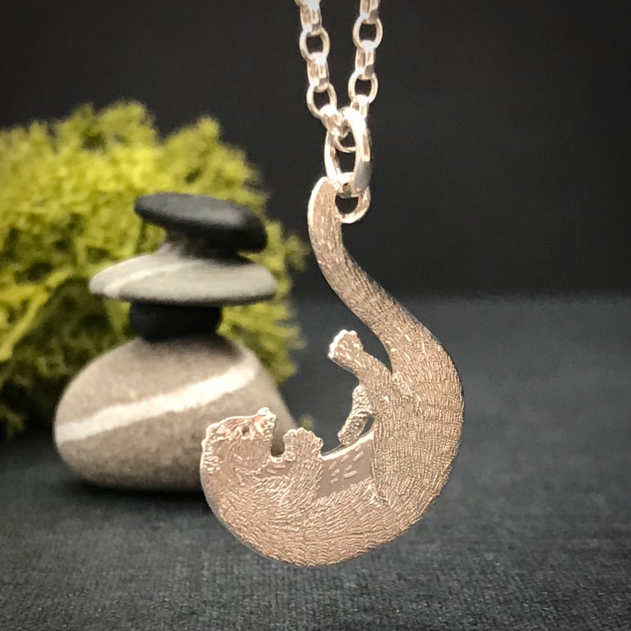 Silver Playing Otter Pendant