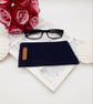 Denim glasses case with purple lining and a chrome popper.   - Image 9