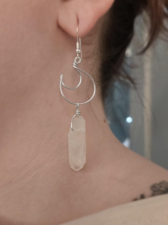 Sterling silver crescent moon dangle earrings with raw clear quartz points