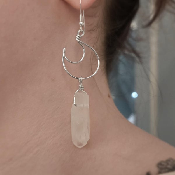 Sterling silver crescent moon dangle earrings with raw clear quartz points