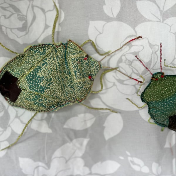 Green Shieldbug textile wall-sculpture 