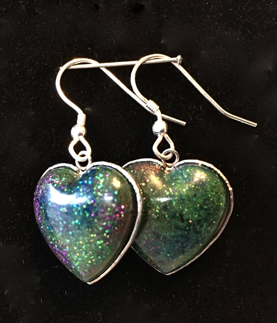 Aurora heart dangly and stud earrings.