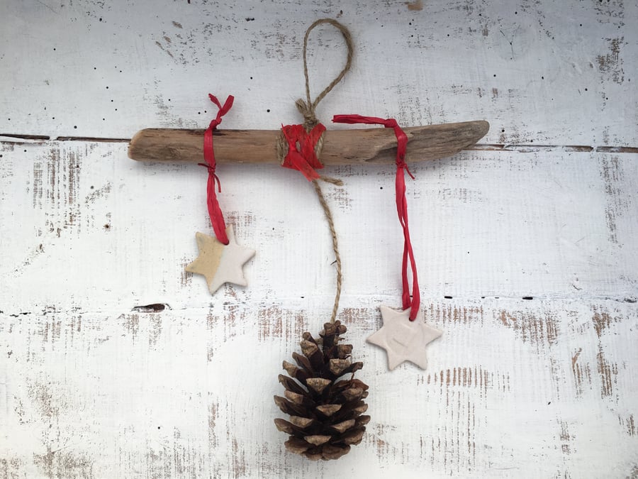 Ceramic driftwood christmas decoration, pine cones, pottery and driftwood