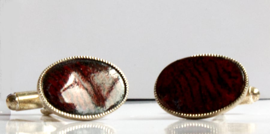 enamel cufflinks - oval: striped red and black over clear enamel