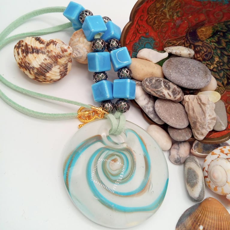 White Glass Pendant with Gold and Blue Cosmic Swirls on a Beaded Necklace