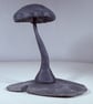 Stone Toadstool, hand cut and carved. Devonian Mudstone on stone base.
