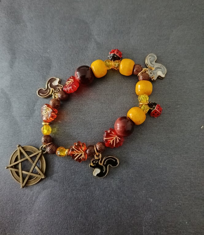 Elasticated nature-inspired beaded charm bracelet with pentacle