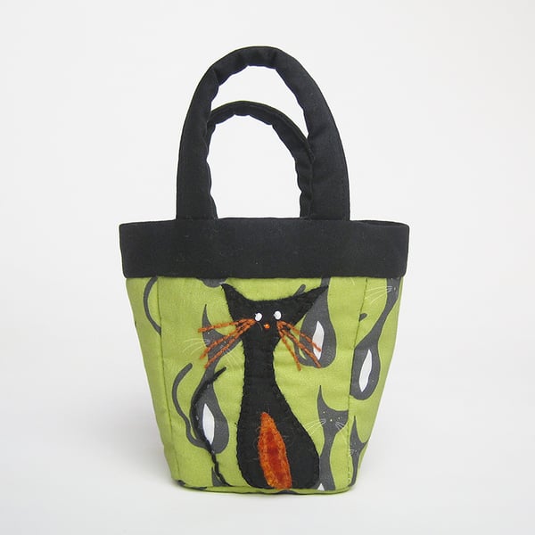 Tiny green bag with cat print and cat appliqué