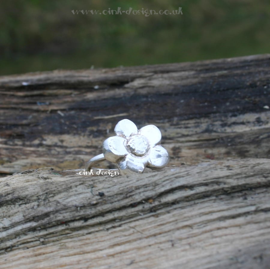 Sterling silver  ring size K with a fine silver flower