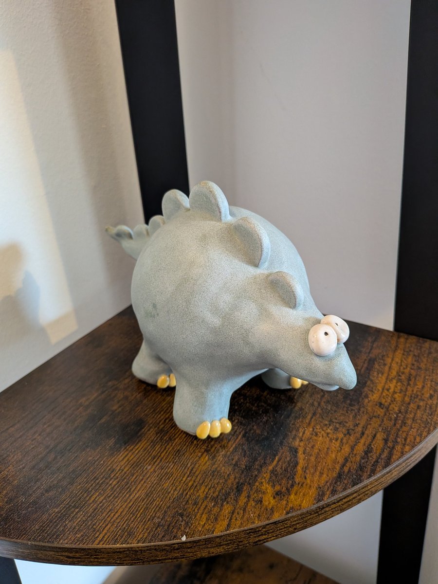 Ceramic stegosaurus ornament, dinosaur figurine 