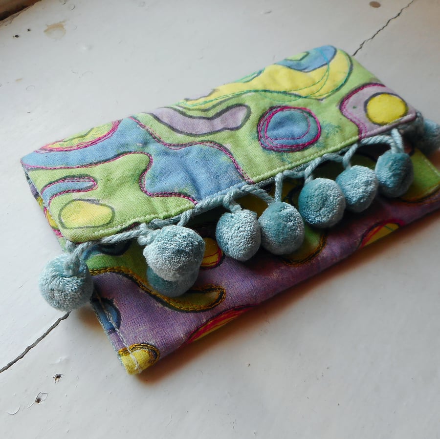 Trippy - hand painted cotton clutch bag with bobble trim
