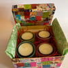 Gift set with 4 decorated tea lights in a decorative box
