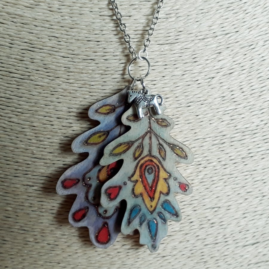 Long Folk art pyrography wooden oak leaf and tibetan silver Dala horse pendant