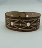 pyrographed leather bracelet featuring gate design - Image 4