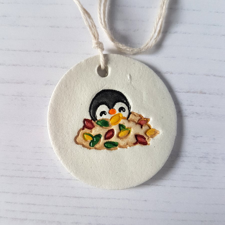 Penguin in leaves hanging decoration, one supplied
