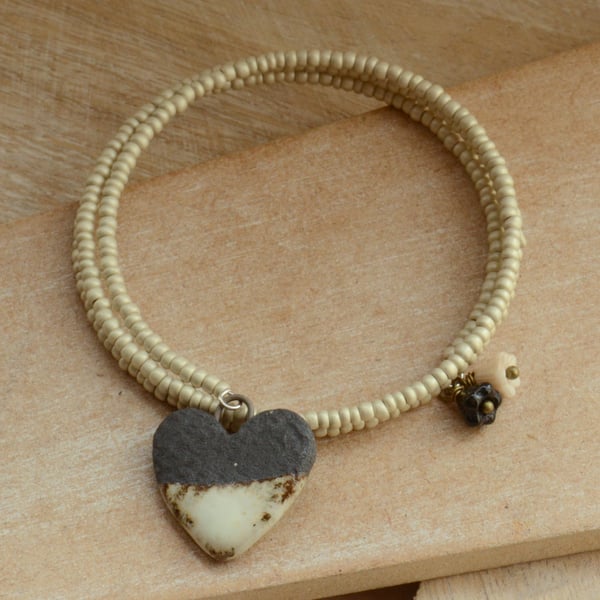 Memory Wire Wrap Cream Seed Bead Bracelet with Ceramic Black Cream Heart
