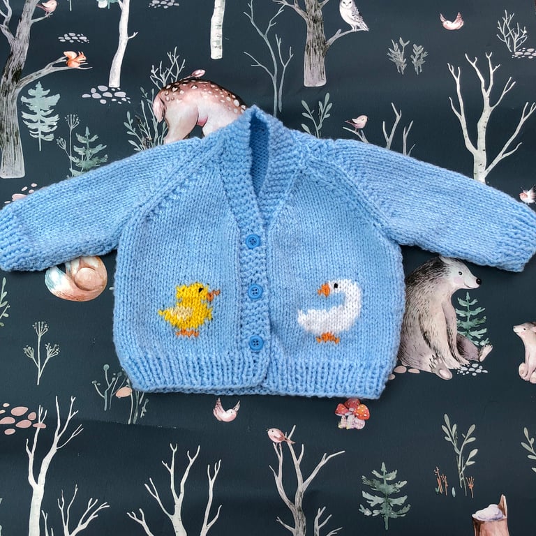 Hand knitted traditional baby cardigan,blue, goose chick ,Heirloom Coming home