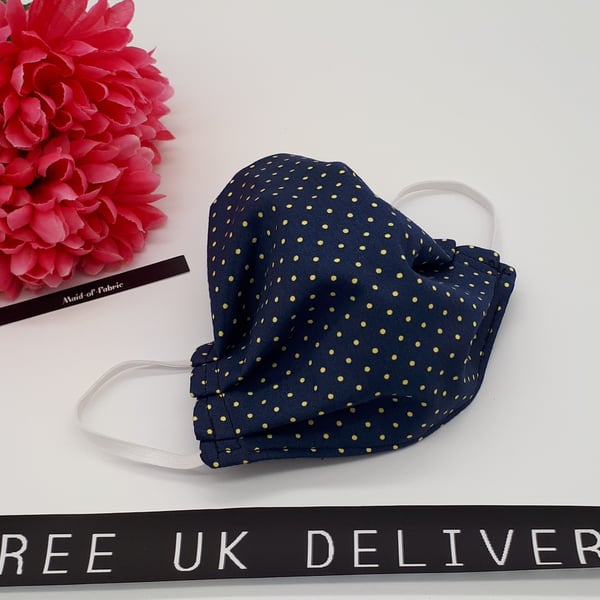 Face mask, small,  3 layer,  machine washable in navy and yellow polkadot fabric