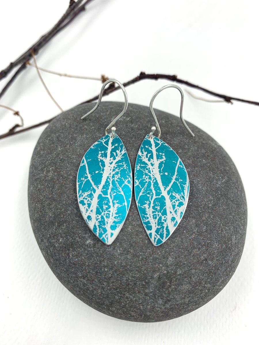 Teal aluminium winter tree earrings.