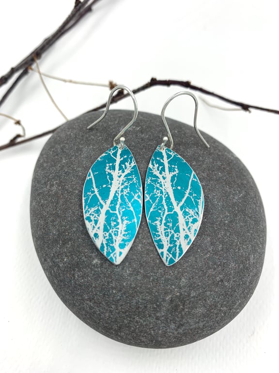 Teal aluminium winter tree earrings.