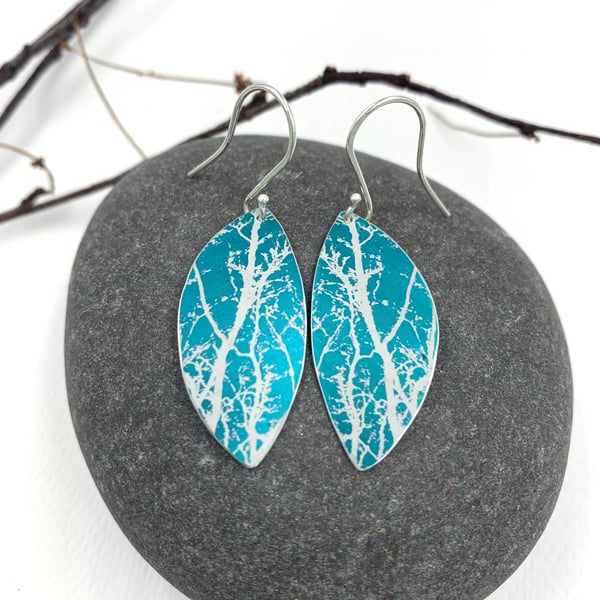 Teal aluminium winter tree earrings.