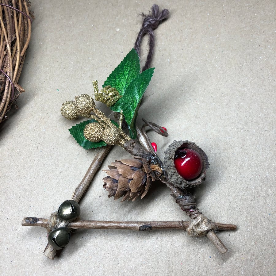 Rustic twine and twig witch bell decoration