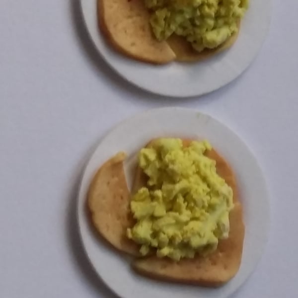 1.12th plates of Scrambled Eggs on Toast