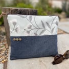 Reclaimed denim and embroidered cotton book pouch zip bag