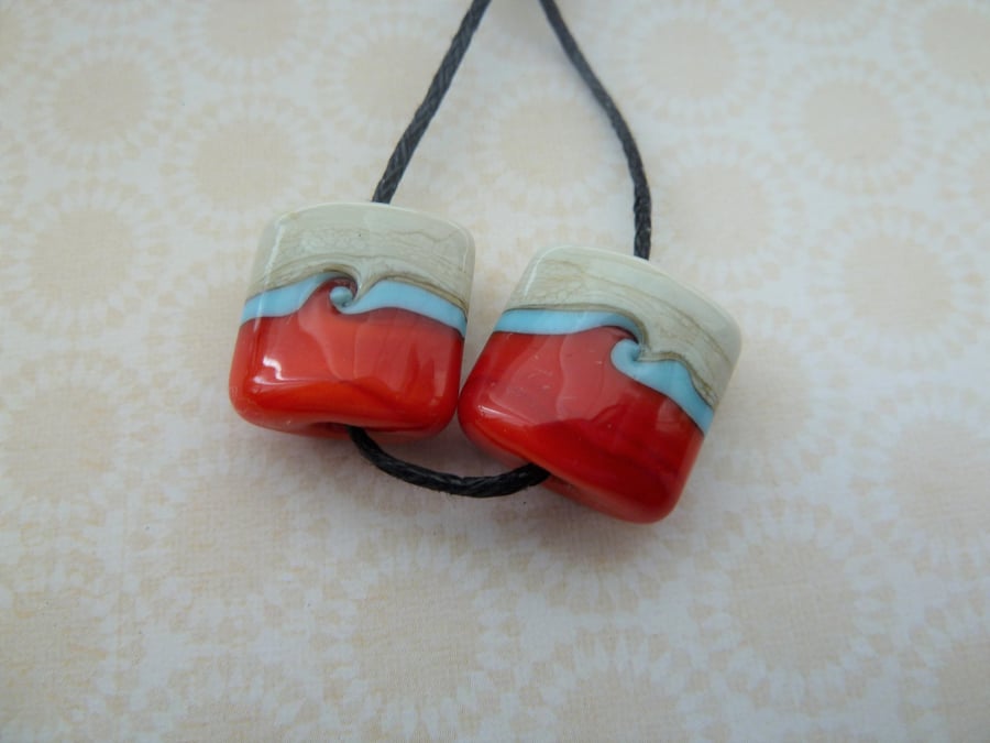 ivory, red and blue lampwork glass beads