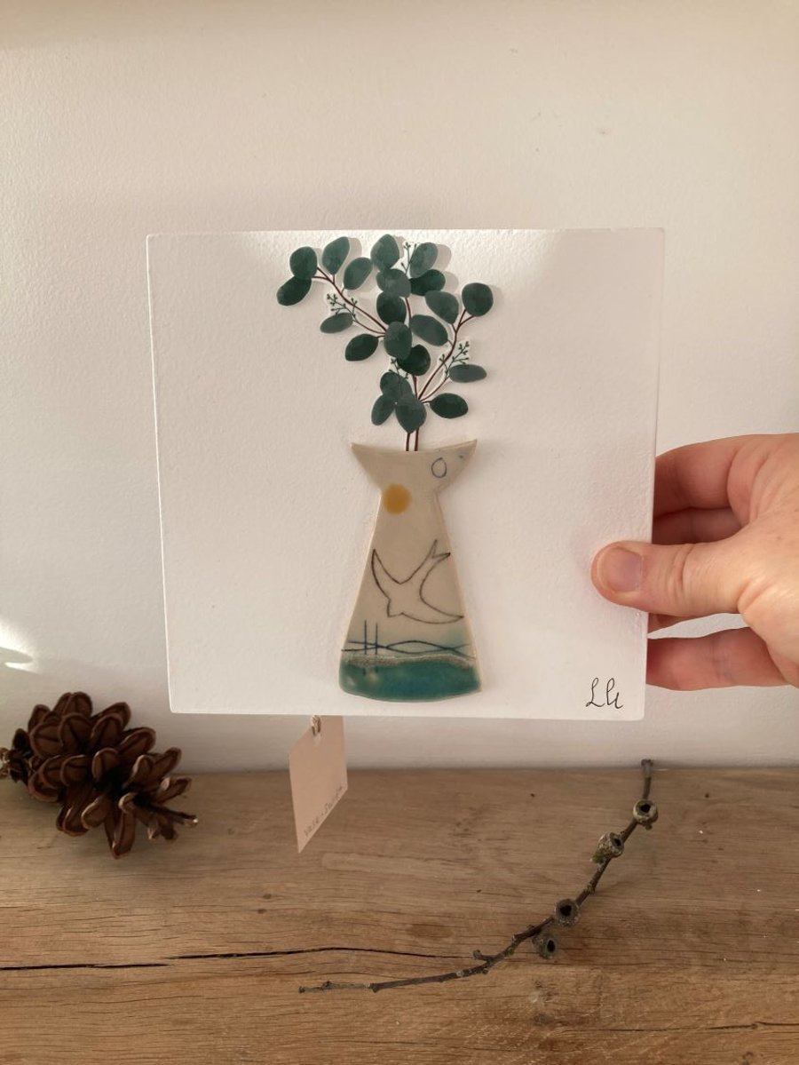 Wall plaque picture - vase, swift and foliage