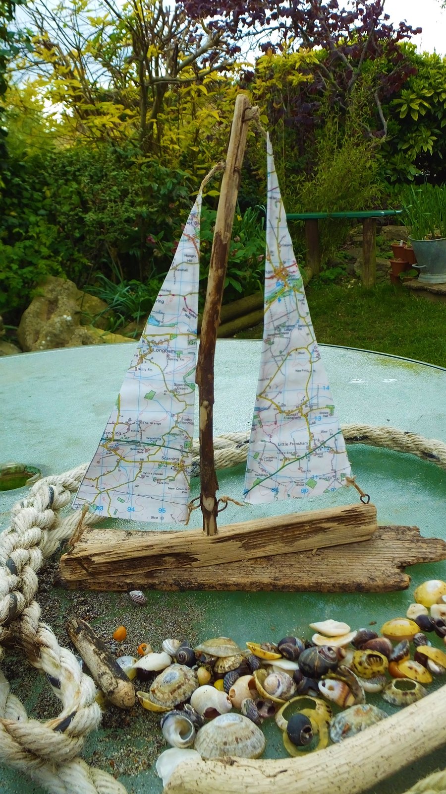 Cornish driftwood sailing ship yacht with ordnance survey map sail decoration