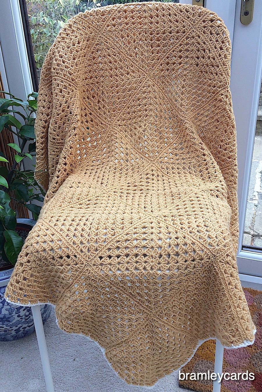 A Honey And Cream Cottage Stargazer Lap Blanket