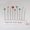 Button and Clay Flower Garden in a Floral Block 'Enjoy the little things'