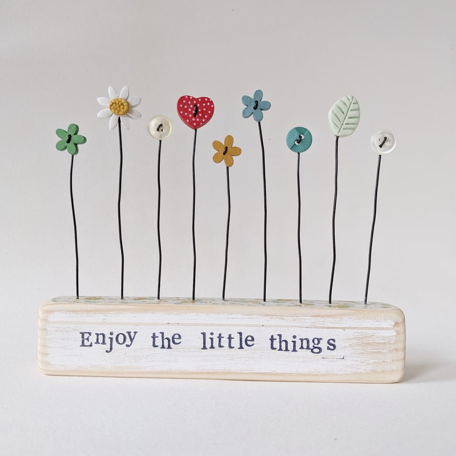 Button and Clay Flower Garden in a Floral Block 'Enjoy the little things'