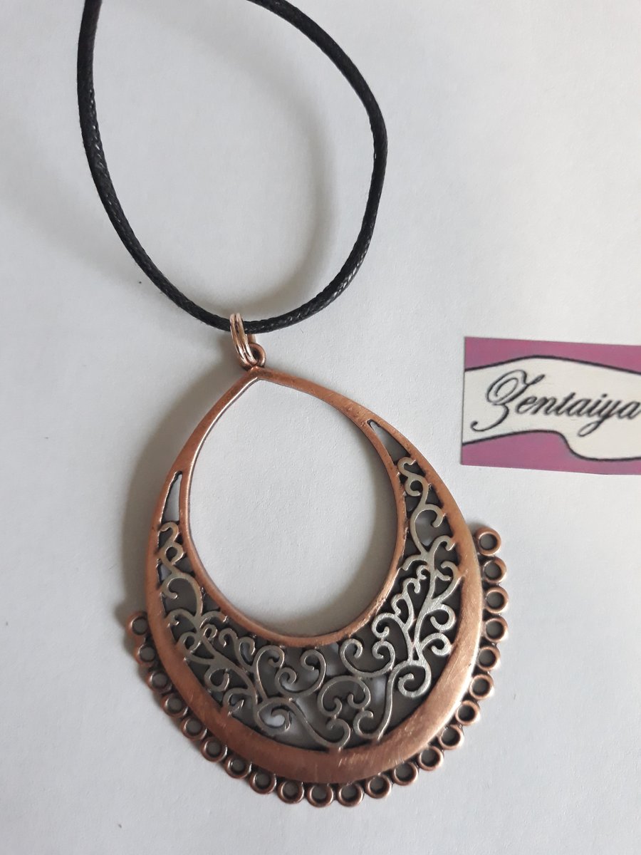 Boho style copper and silver coloured  pendant necklace