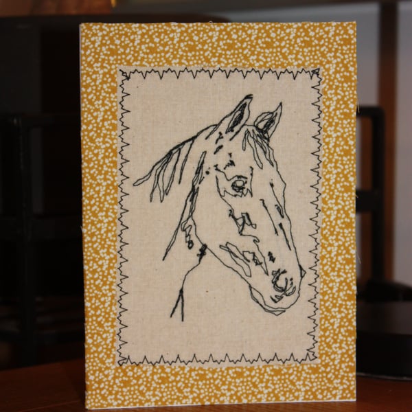 Horse head with a textured border