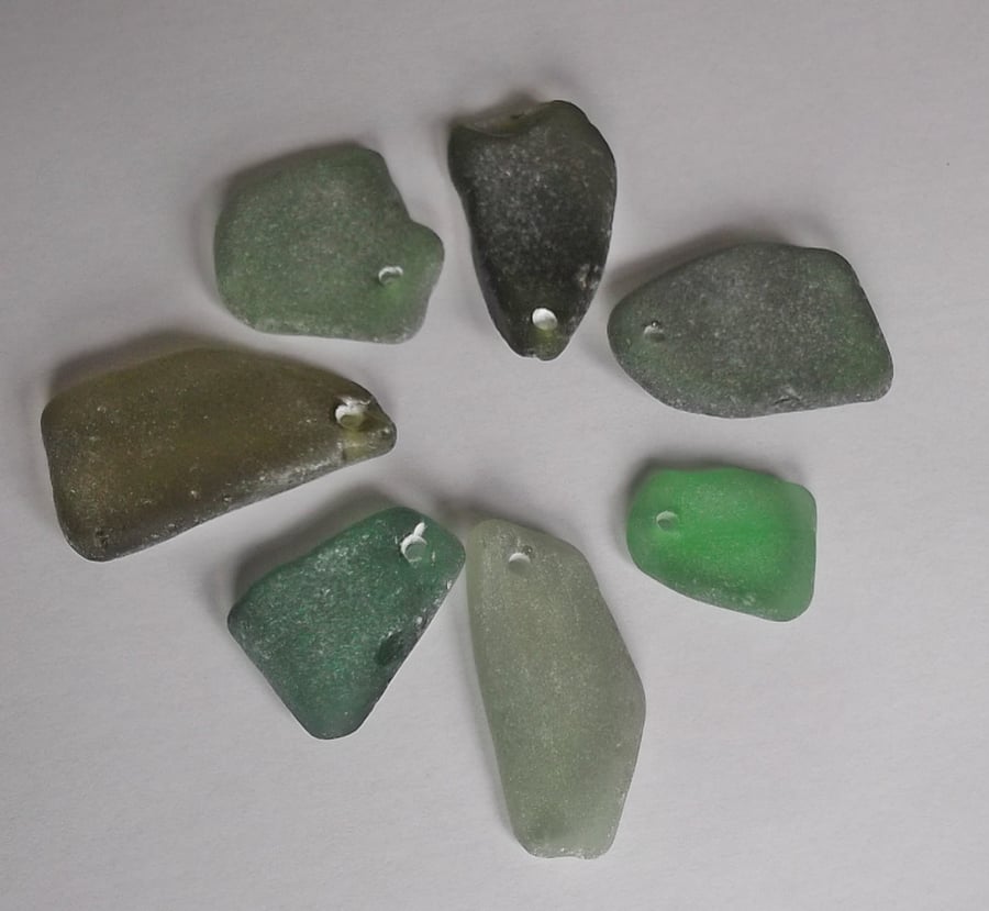 Drilled green sea glass pendants