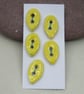 5 Small Leaf Shaped Lemon Yellow Ceramic Buttons - Image 1