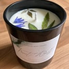 Vegan soy candle, woodsy forest fragrance with dried botanical decorations