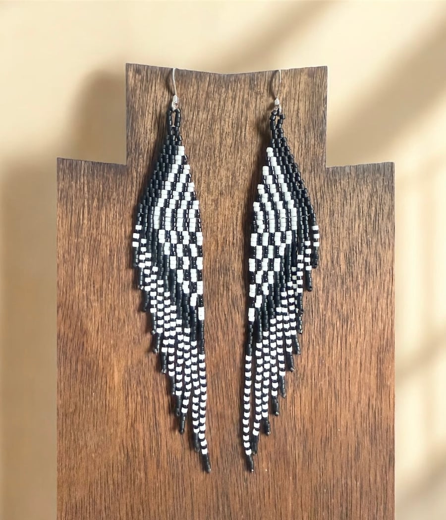 Handwoven beaded feather fringe earrings in black and white