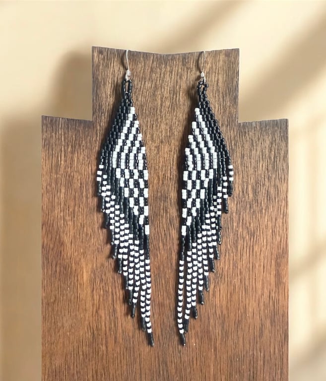 Handwoven beaded feather fringe earrings in black and white