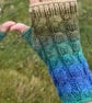 Hand knitted fingerless gloves featuring cable knit pattern.     MOUNTAIN RIVER  - Image 3