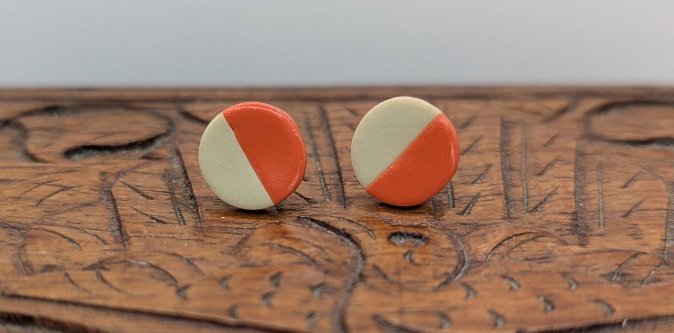 Orange and stone colour stud earrings 