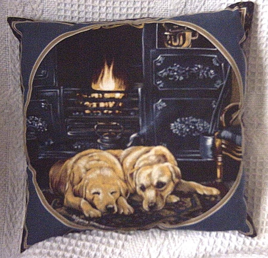 Two golden Labradors resting in the kitchen cushion 