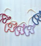 Elephant garland, knitted bunting